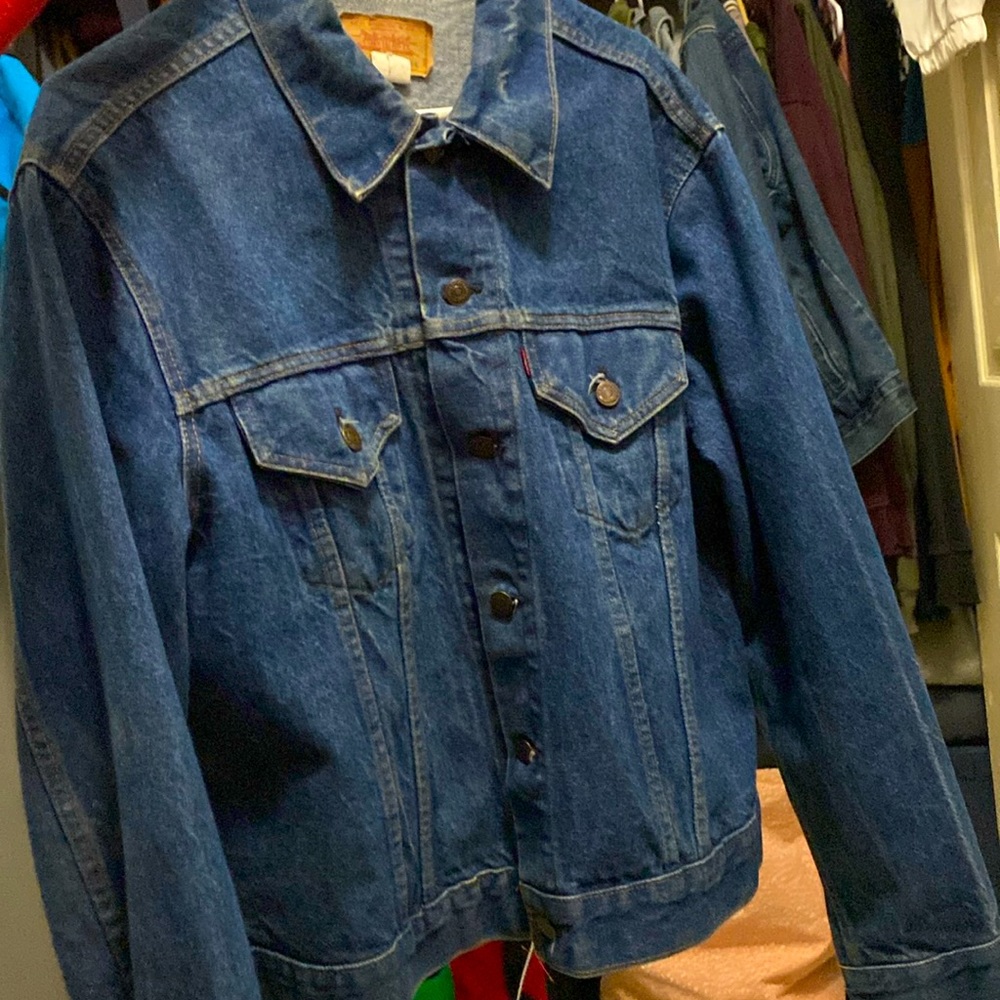 Dark wash Levi’s denim jacket